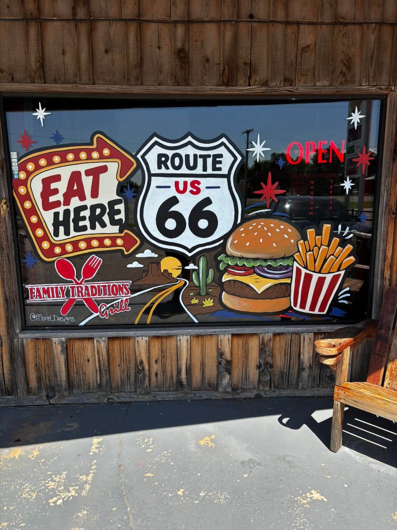 Hand-painted Route 66 window mural at Family Traditions Grill in Canute, Oklahoma